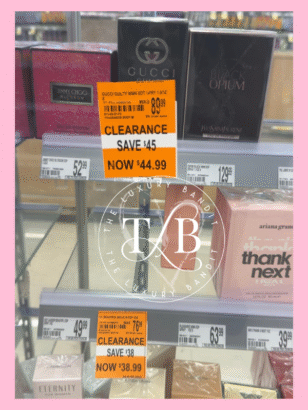 A shelf of luxury fragrances at a drugstore, including Gucci Guilty and YSL Black Opium, both on deep clearance with bright orange tags. A perfect example of a luxury fragrance clearance and drugstore perfume hacks that reveal affordable designer scents hidden in plain sight.